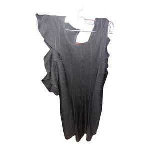 Little black dress with side ruffle.